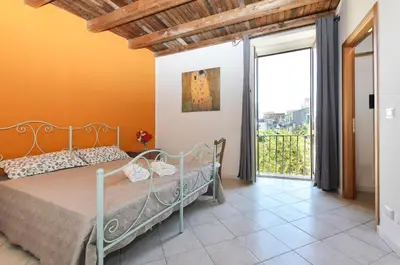 Letto o letti in una camera di Noto Garden Holiday Home