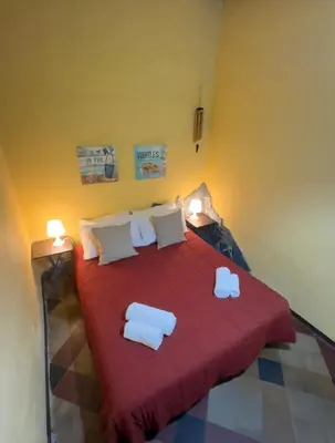 Letto o letti in una camera di Casa Benedettini home Catania appartamento centro storico