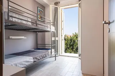 Letto o letti in una camera di Appartamenti Rimembranze