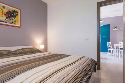 Letto o letti in una camera di Appartamenti Rimembranze