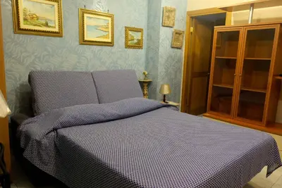 Letto o letti in una camera di B&B TascaPachino