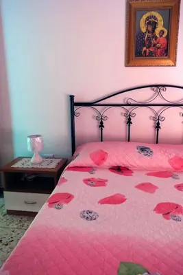 Letto o letti in una camera di B&B TascaPachino