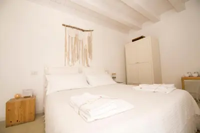 Letto o letti in una camera di Casa Memi