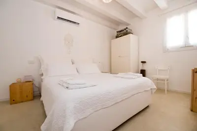 Letto o letti in una camera di Casa Memi