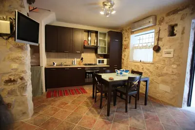 Cucina o angolo cottura di Le Case Dello Zodiaco albergo diffuso