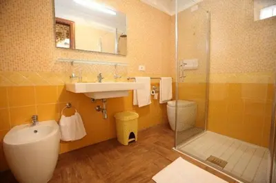 Bagno di Le Case Dello Zodiaco albergo diffuso
