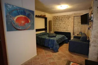 Letto o letti in una camera di Le Case Dello Zodiaco albergo diffuso