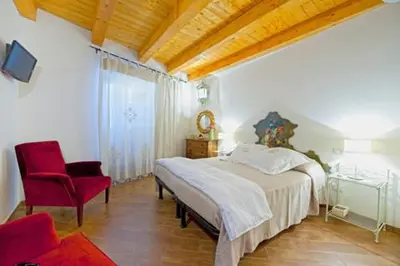 Letto o letti in una camera di Le Case Dello Zodiaco albergo diffuso