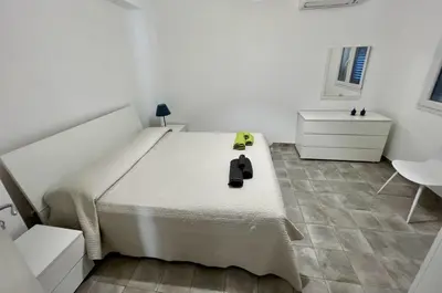 Letto o letti in una camera di Appartamenti San Lorenzo Marzamemi Cecilia