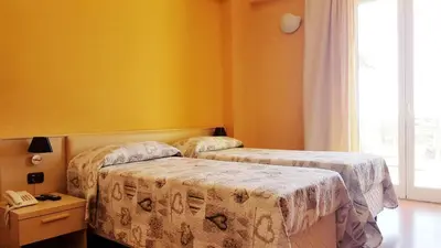 Letto o letti in una camera di Hotel Paclà
