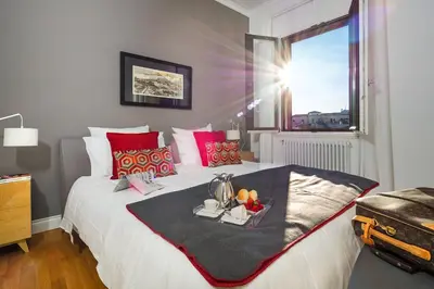 Letto o letti in una camera di Penthouse Duomo