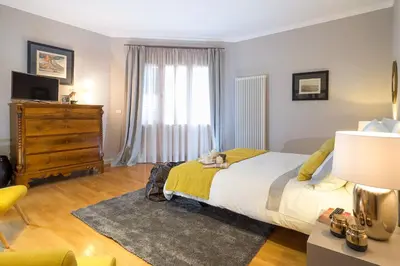 Letto o letti in una camera di Penthouse Duomo