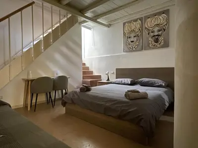 Letto o letti in una camera di Casa della Palma