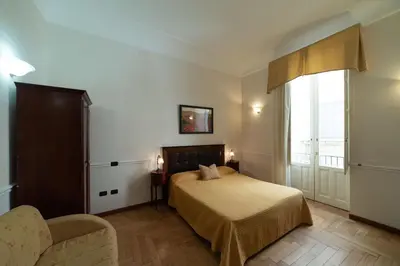 Letto o letti in una camera di Residence Acropoli