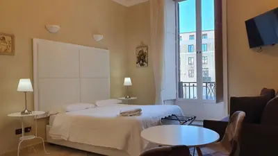 Letto o letti in una camera di B&B Diana