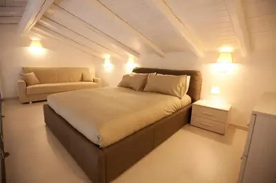 Letto o letti in una camera di Italiana Resort Maniace