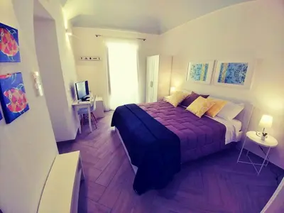 Letto o letti in una camera di Le Nuvole di Ortigia