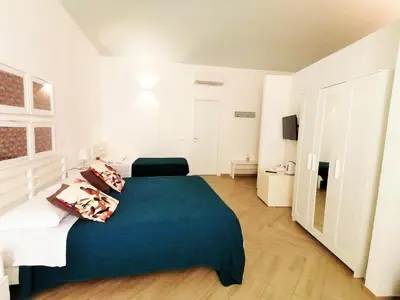 Letto o letti in una camera di Le Nuvole di Ortigia