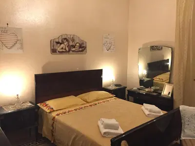Letto o letti in una camera di Al.Fa