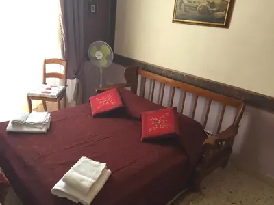 Letto o letti in una camera di Al.Fa