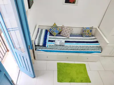 Letto o letti in una camera di Ortigia Vista Cielo e Mare - ortigiavistamareonweb it