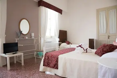 Letto o letti in una camera di BellAqua