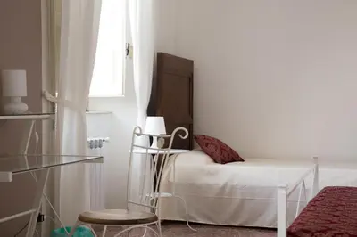 Letto o letti in una camera di BellAqua