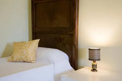 Letto o letti in una camera di BellAqua
