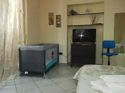 Letto o letti in una camera di Casa Desirè