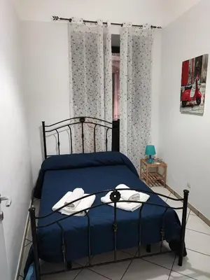 Letto o letti in una camera di Casa Desirè