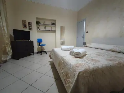 Letto o letti in una camera di Casa Desirè