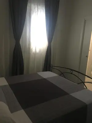 Letto o letti in una camera di Aeroporto Bellini Rooms