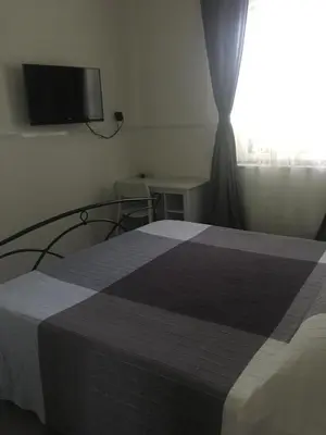 Letto o letti in una camera di Aeroporto Bellini Rooms