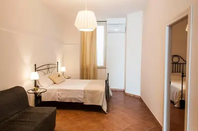 Letto o letti in una camera di Ninetta
