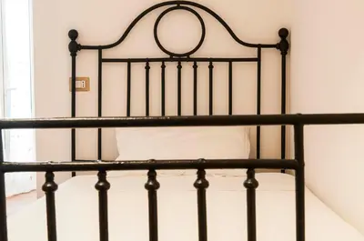 Letto o letti in una camera di Ninetta