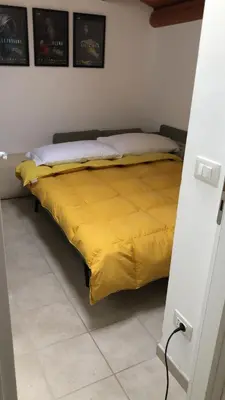 Letto o letti in una camera di A casa da Anita