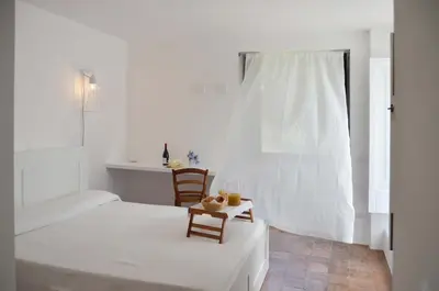 Letto o letti in una camera di Villa Canisello