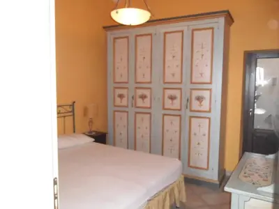 Letto o letti in una camera di Casa vistamare Alfeo