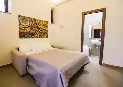 Letto o letti in una camera di La Palma Studios