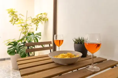 Bevande di GuestHost - Casa Borbonica Cozy Apartment in Ortigia GROUND FLOOR