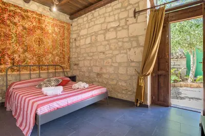 Letto o letti in una camera di In campagna al Mauto