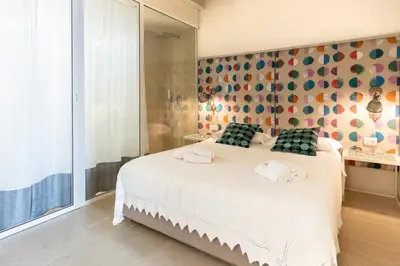 Letto o letti in una camera di Blue Levante Vista Mare con terrazza