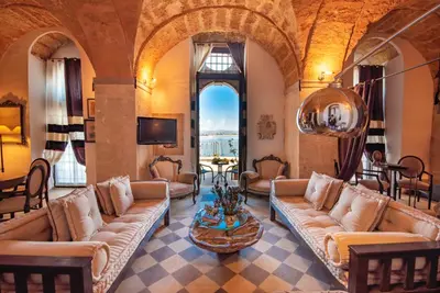 Area soggiorno di Maniace Suites Terrace Sea View