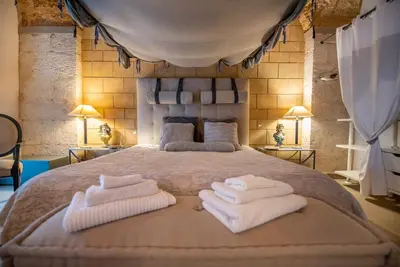 Letto o letti in una camera di Maniace Suites Terrace Sea View