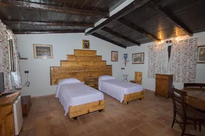 Letto o letti in una camera di Agriturismo Papyrus