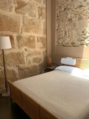 Letto o letti in una camera di Chiusa Di Carlo Agriturismo