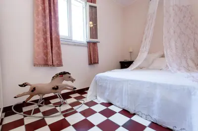 Letto o letti in una camera di Dimora Birullà