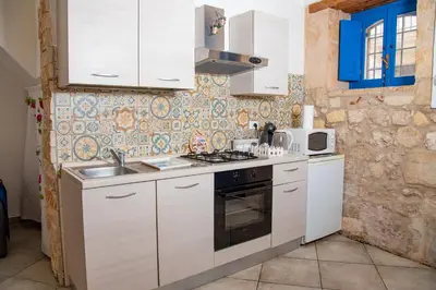 Cucina o angolo cottura di Siracusa Camere Tiche & Selene