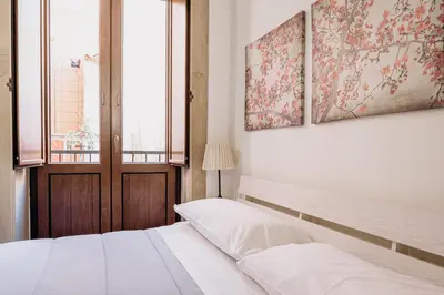 Letto o letti in una camera di Siracusa Camere Tiche & Selene