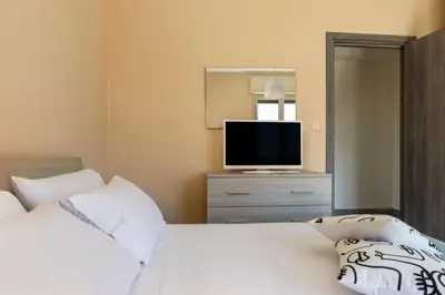Letto o letti in una camera di Al Castello - Etna e Mare